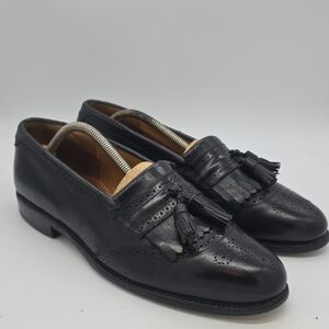 Allen Edmonds Black Leather Tassel Kiltie Loafers with Brogue Detail